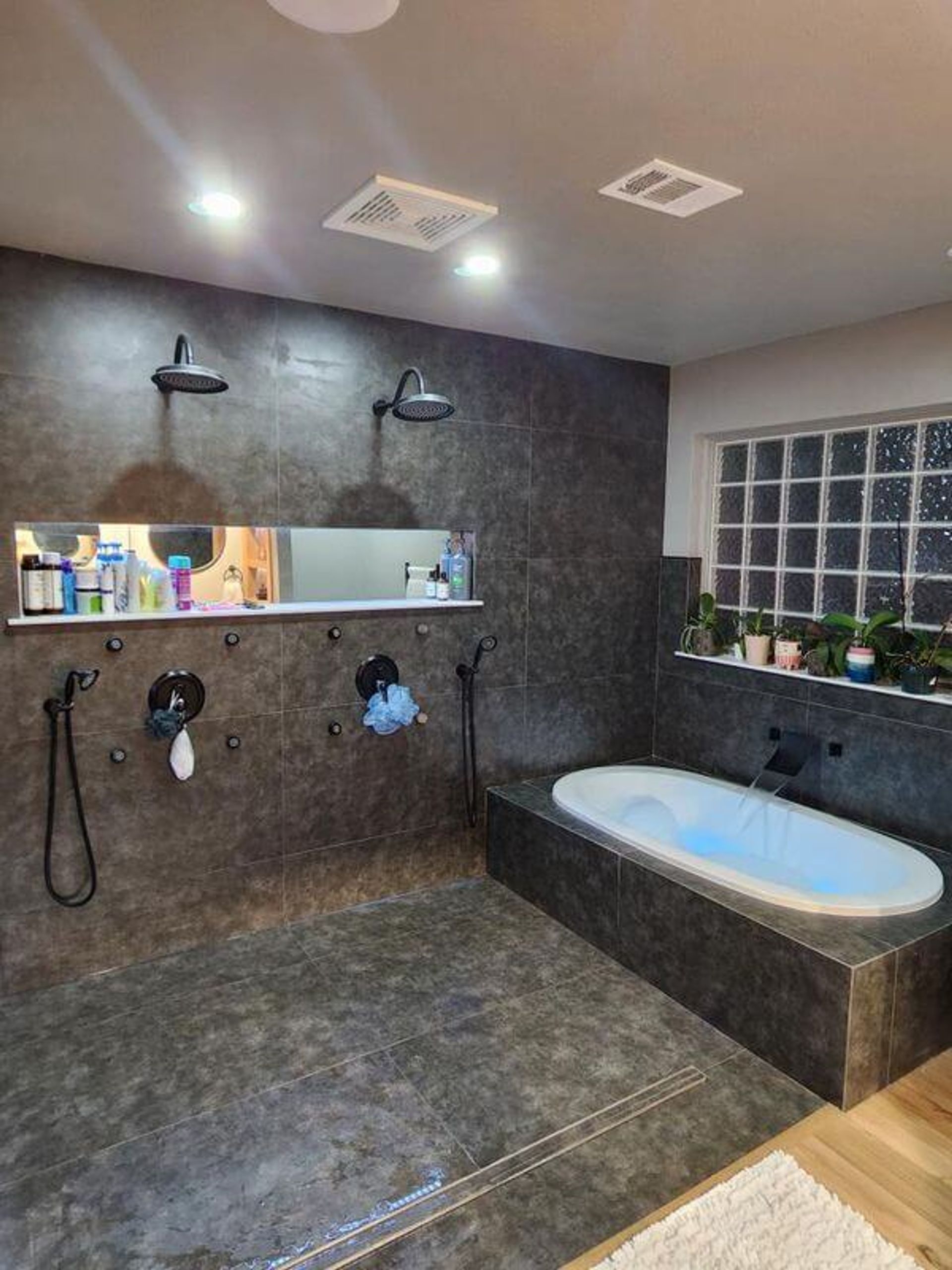 custom bathroom with bath and shower